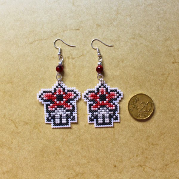 Pendientes frikis del Demogorgon bordados a punto de cruz hechos a mano