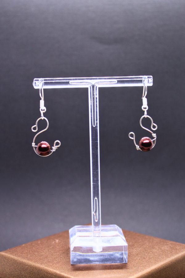 Reliquia de Bolsillo con Elegancia Sospechosa