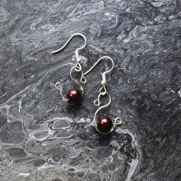 Reliquia de Bolsillo con Elegancia Sospechosa